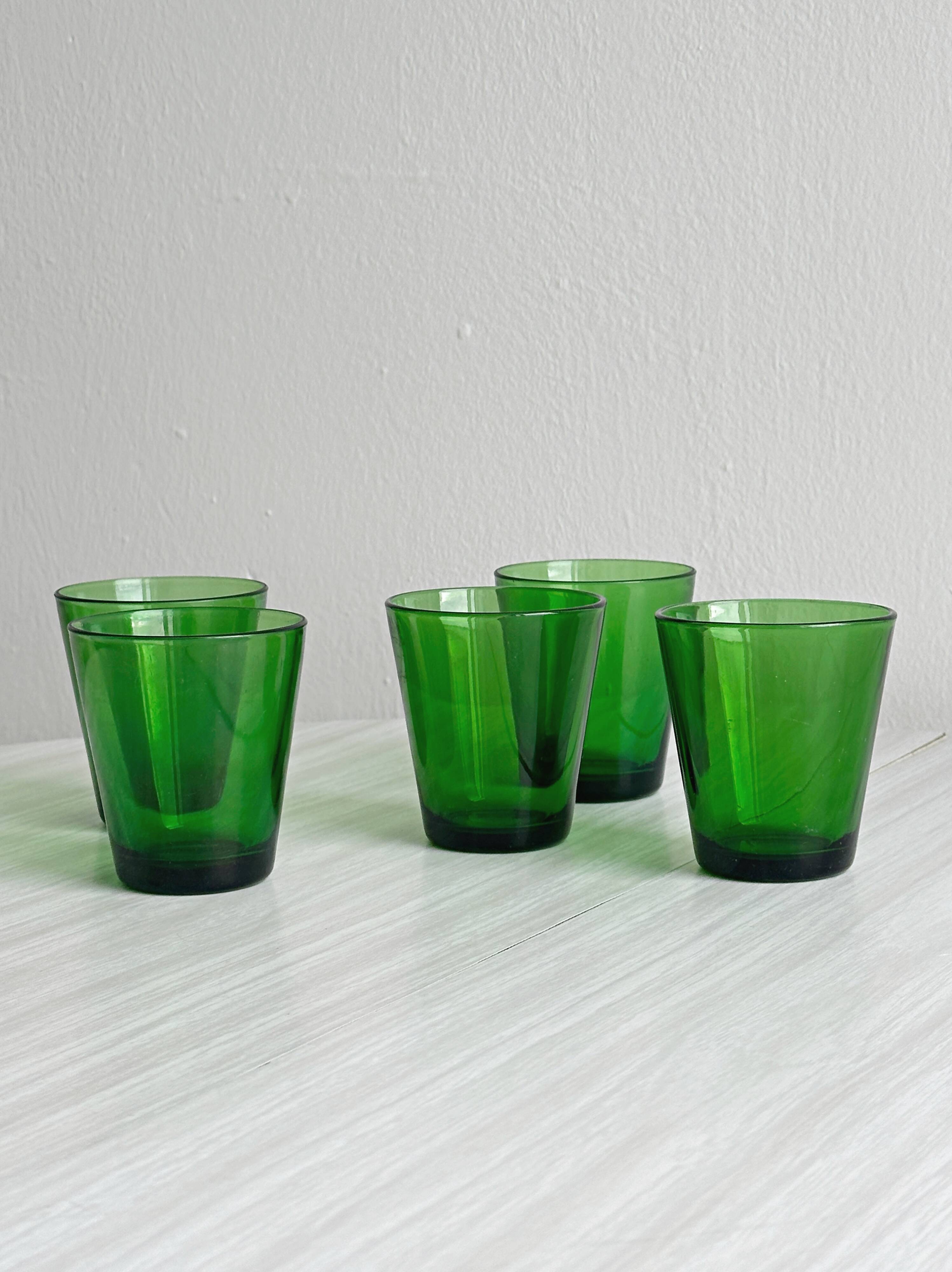 5 translucent green glasses
