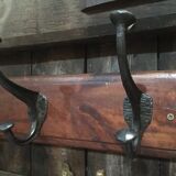 Metal patère on wood