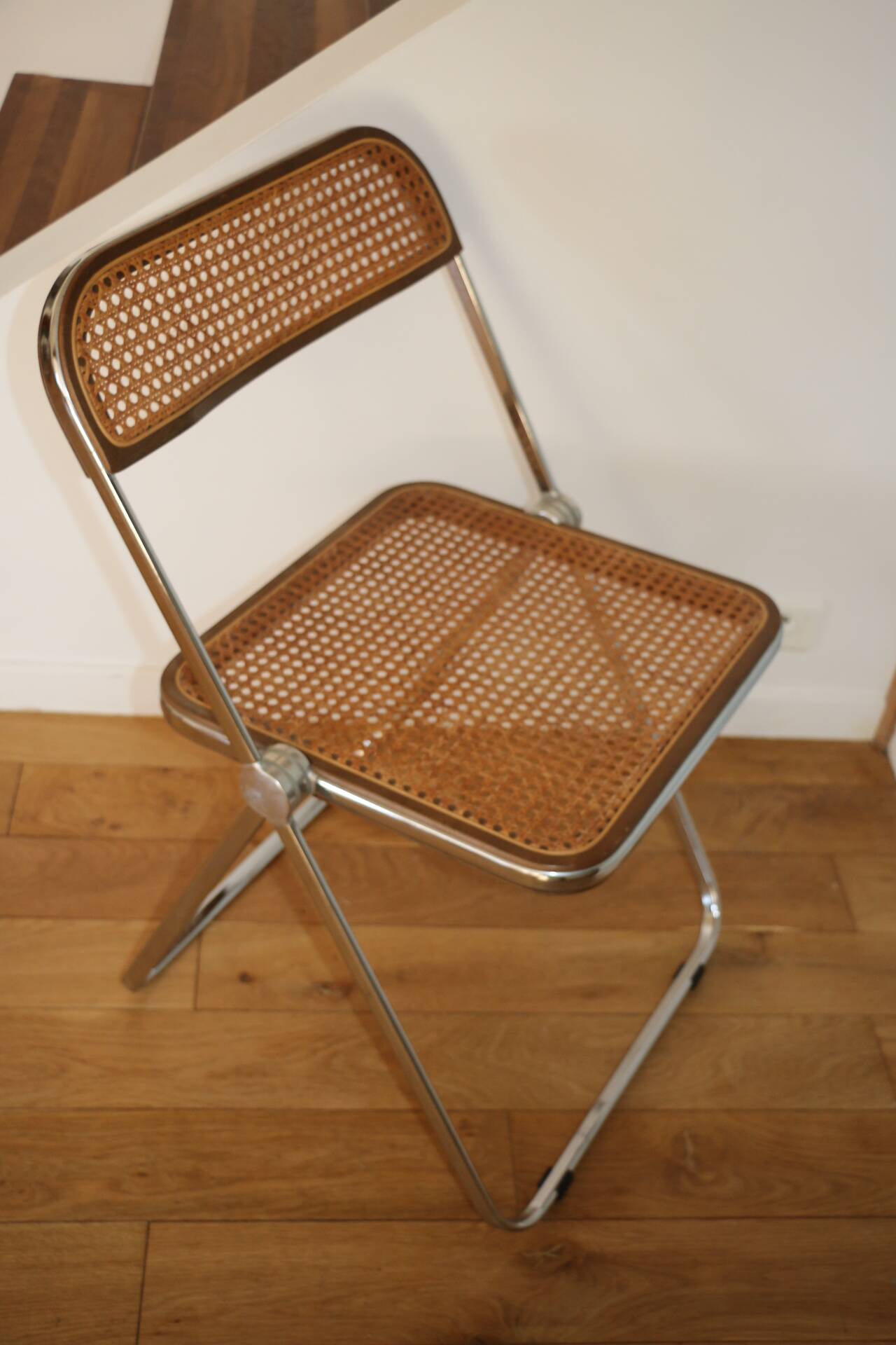 2 plia rattan chairs by piretti