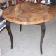 Round table art deco style - elm magnifying glass top and black wooden legs