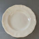 8 white porcelain plates