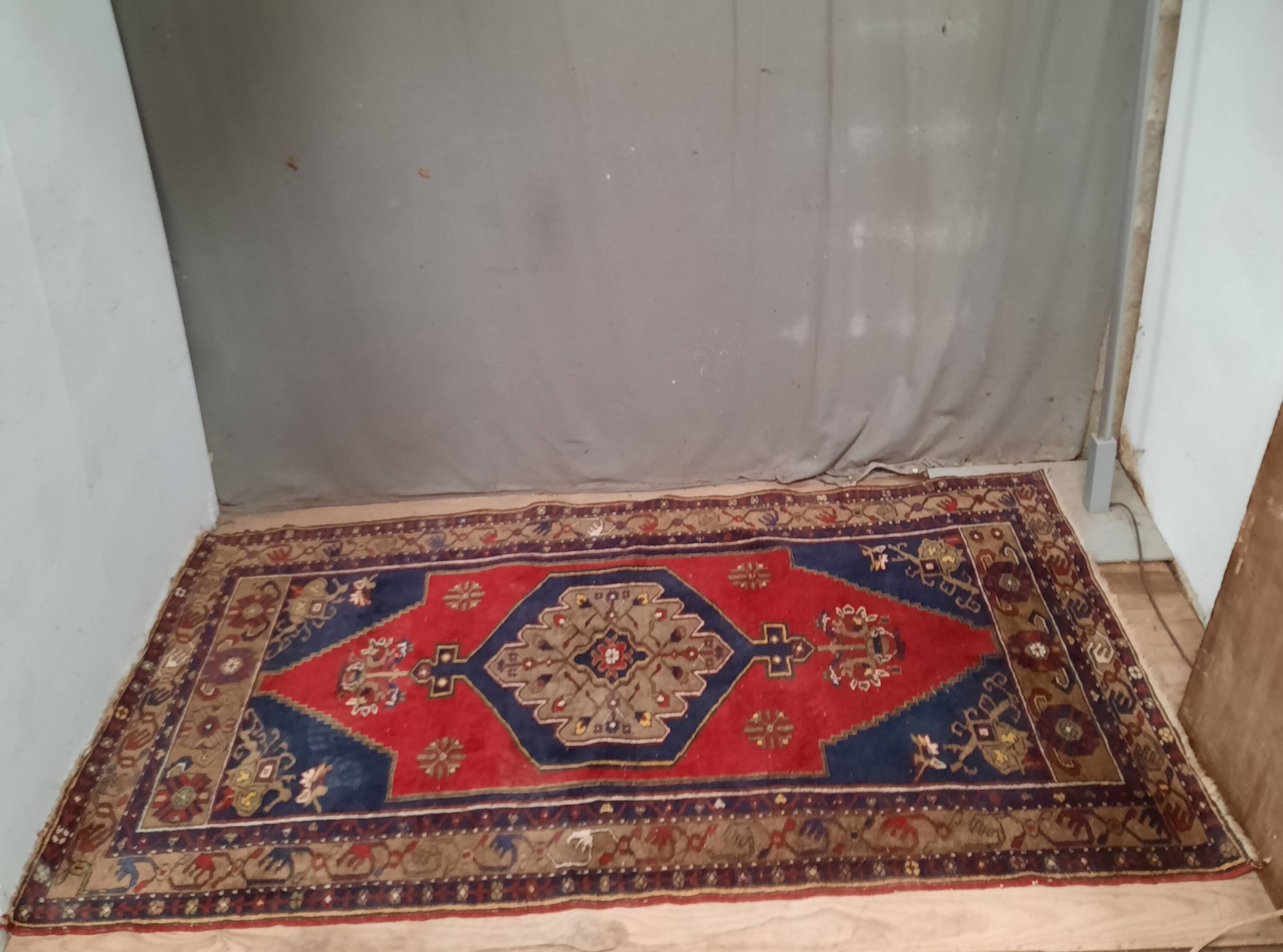 Handmade blue and red rug