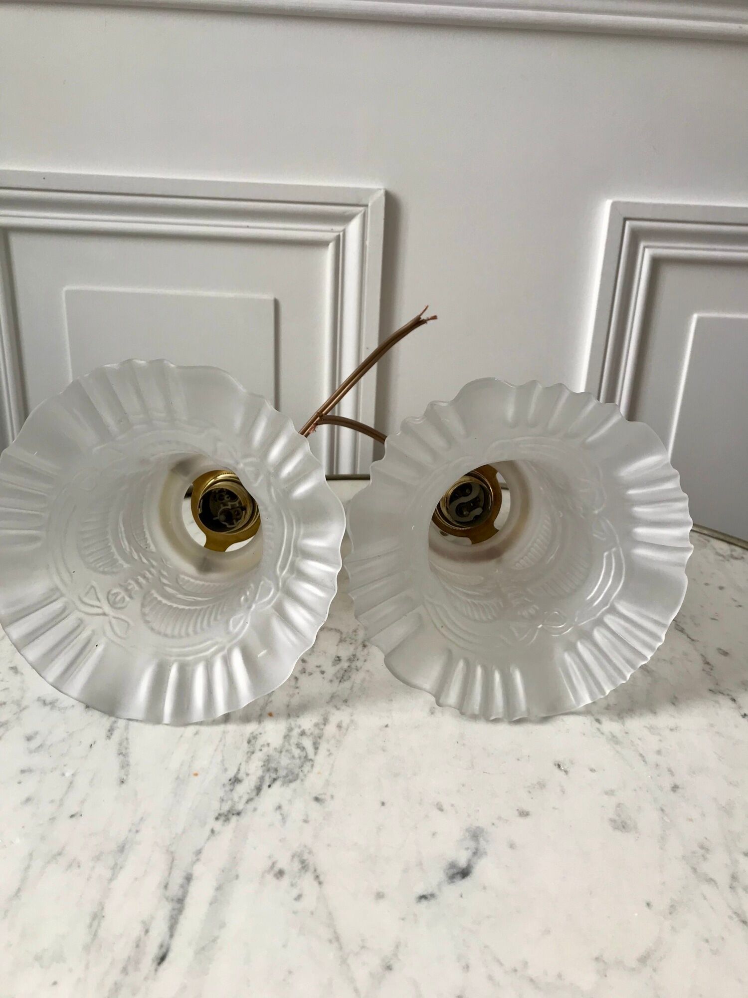 Pair of tulip wall lamps in molded glass on porcelain support 20s