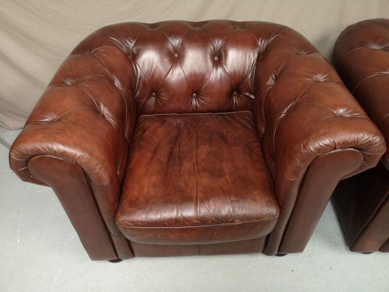 Brown brown leather chesterfield armchairs