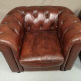 Brown brown leather chesterfield armchairs