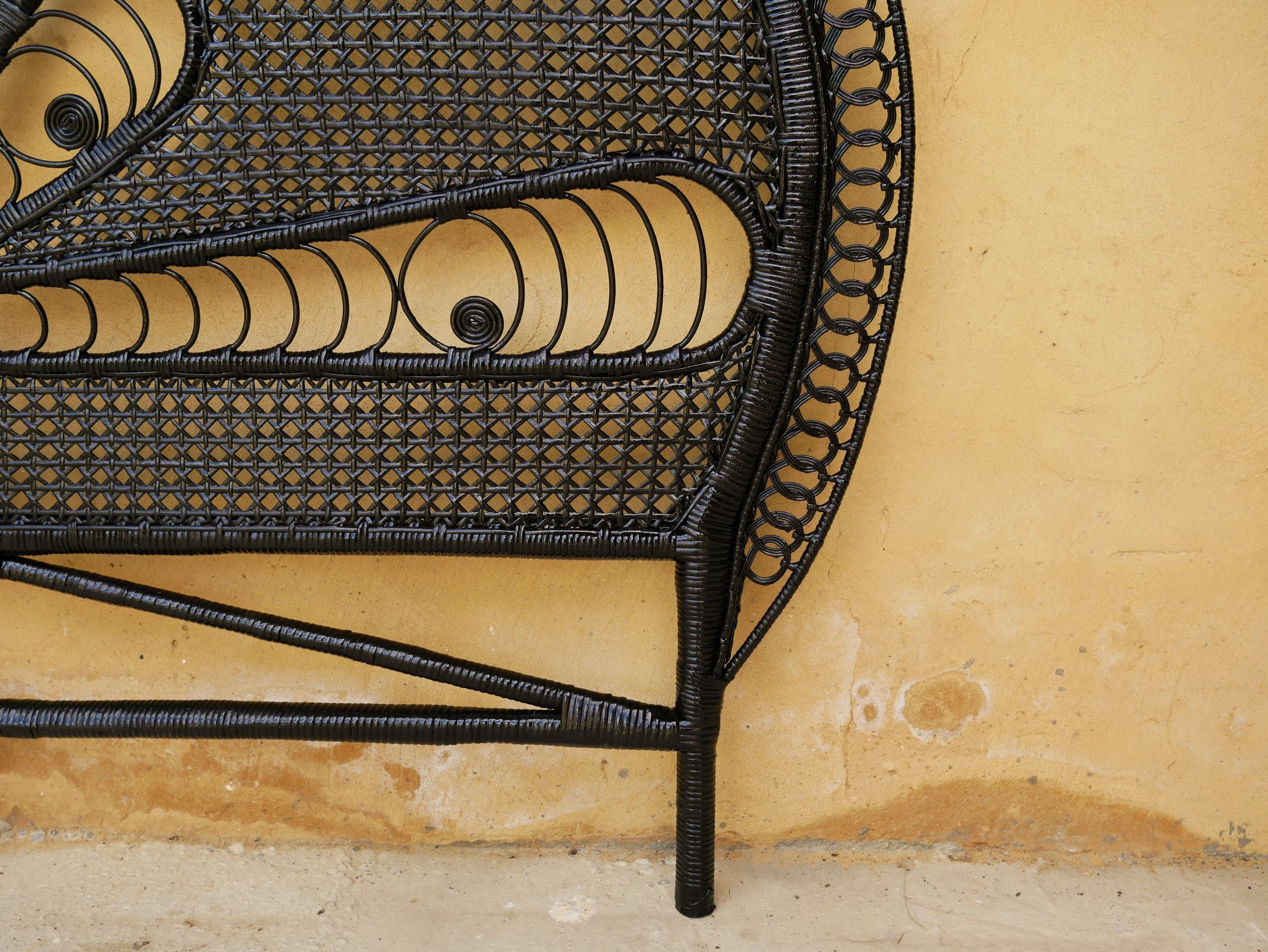 Vintage headboard in black rattan