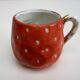 Tasse ancienne en porcelaine « fraise »