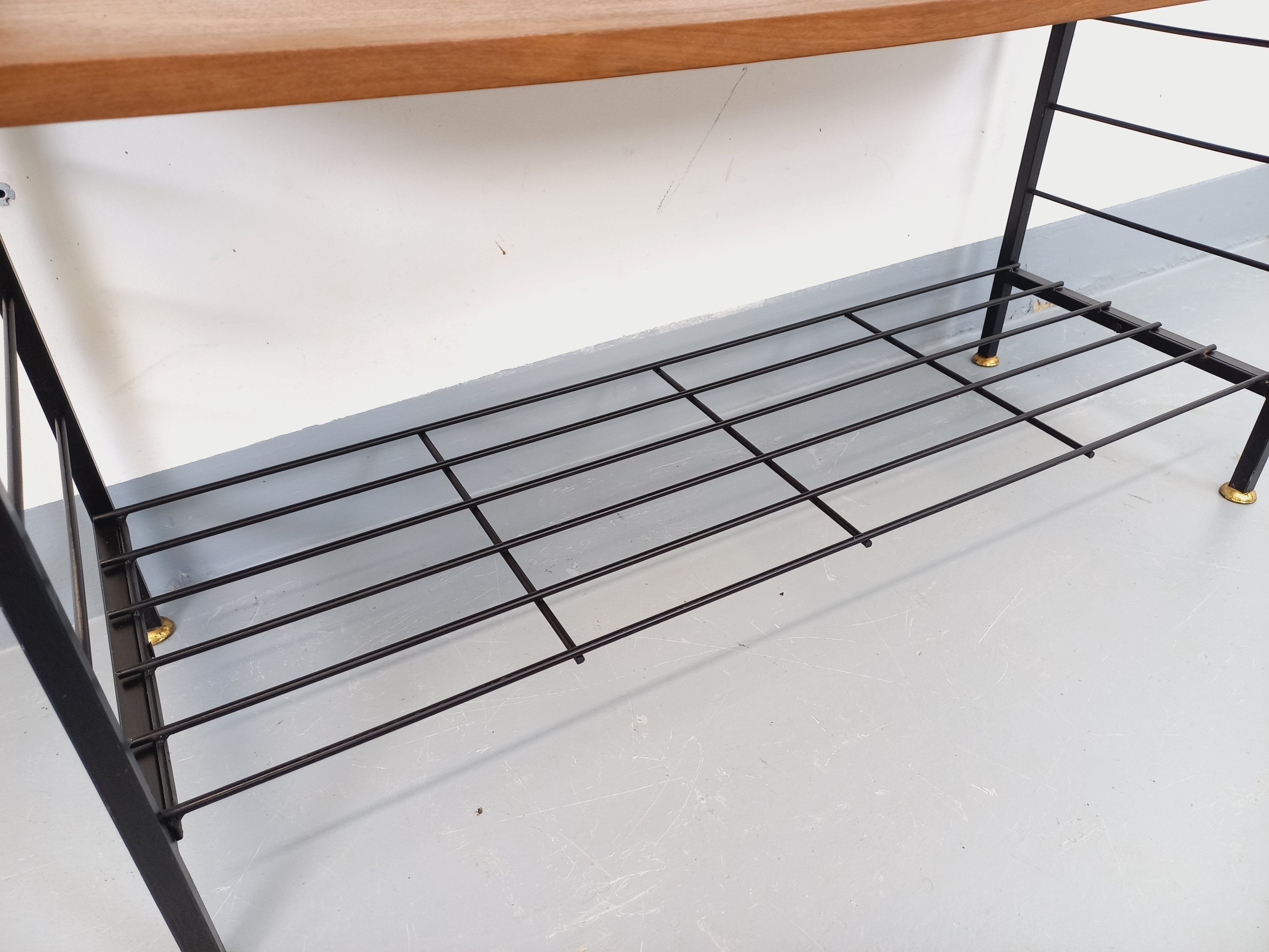 Vintage Italian bookshelf in teak and metal from the 1960s.