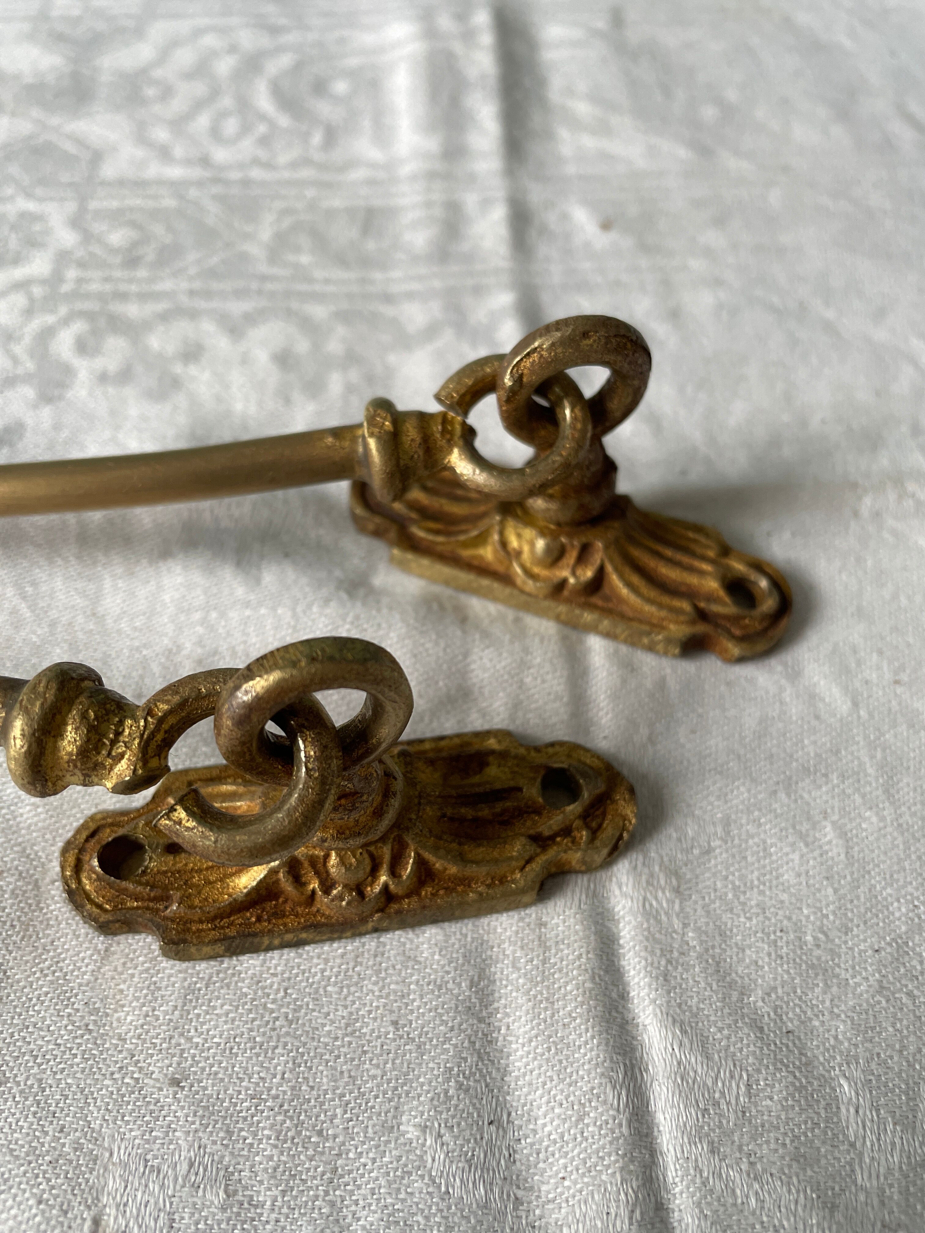 Pair of Napoleon III gilt bronze tiebacks