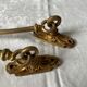 Pair of Napoleon III gilt bronze tiebacks