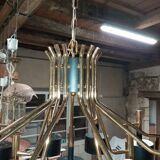 Black chandelier and gilded metal
