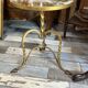 Pair of small side tables or end tables in gilded wrought iron, typical of the 1950s/1960s.