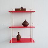 Mid century wall shelf in red and white in the string design, narrow modular hanging shelf