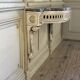 Louis XVI wall console in carved wood, grey patina, 18th century.