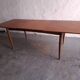 Scandinavian type table with integrated extension