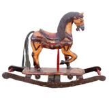 Cheval à bascule en bois