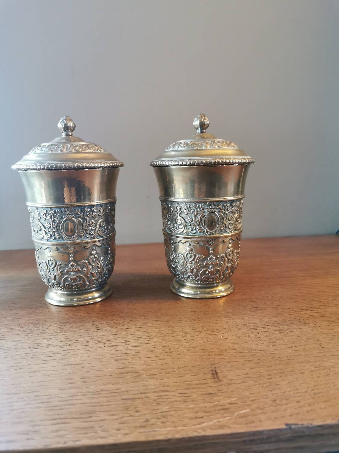 Pair of antique chiseled metal candy boxes