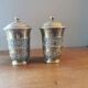 Pair of antique chiseled metal candy boxes