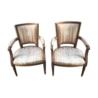 Pair of Louis XVI convertible armchairs