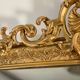 Miroir ancien Louis Philippe doré à fronton