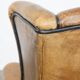 Sheep leather wingback chair finished with black piping