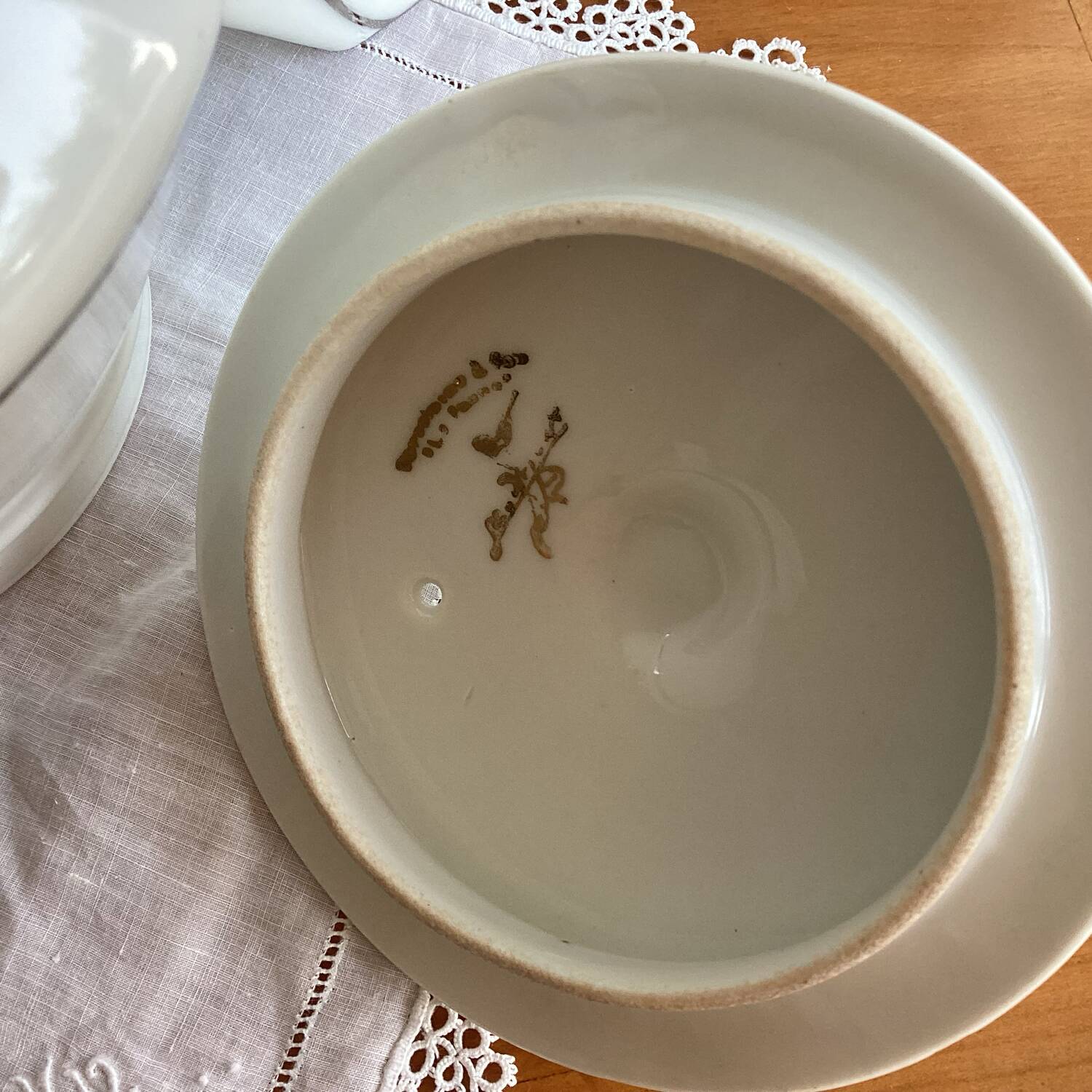 Antique porcelain coffee pot with stamped fire