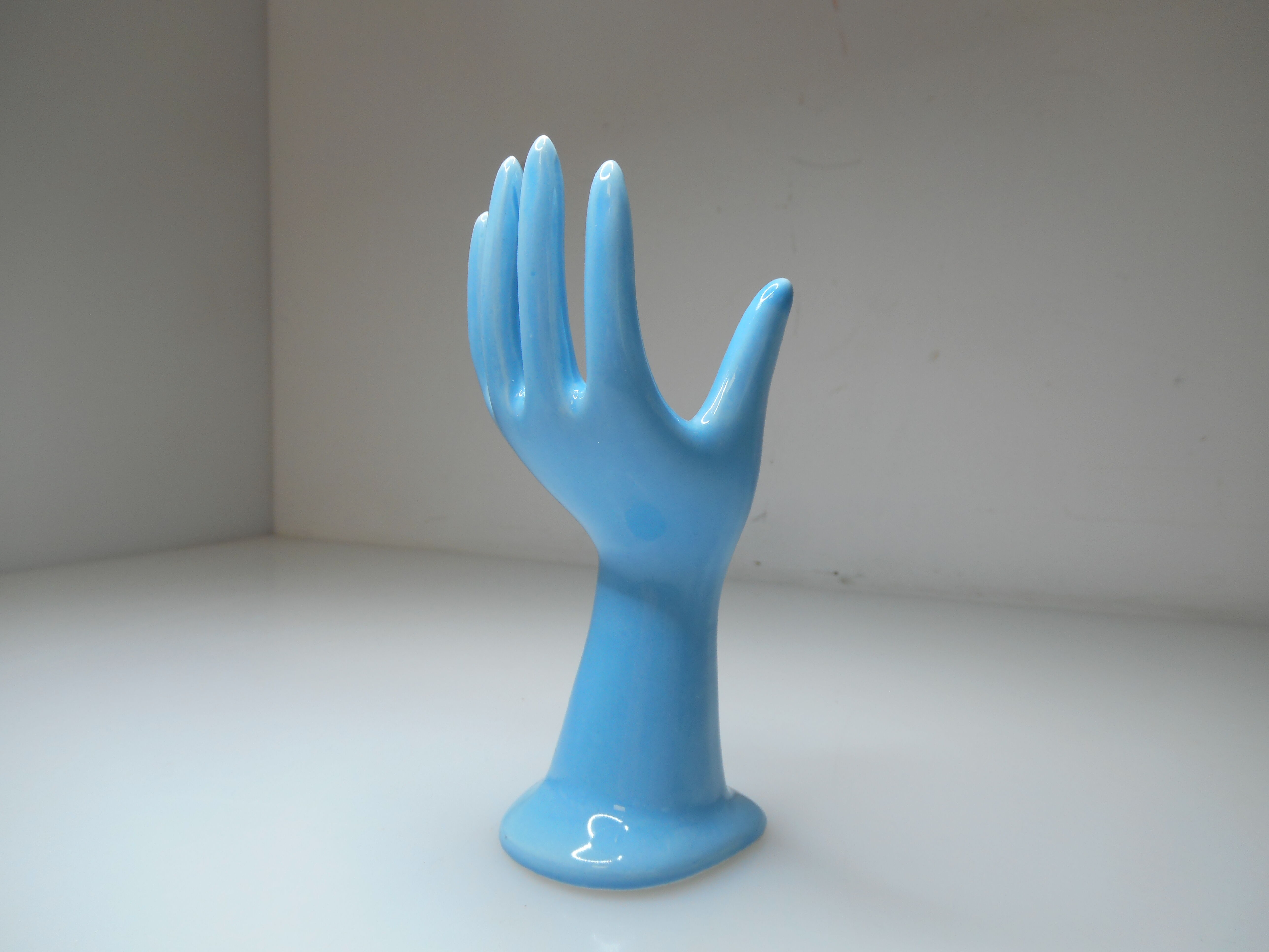 Vintage light blue ceramic hand