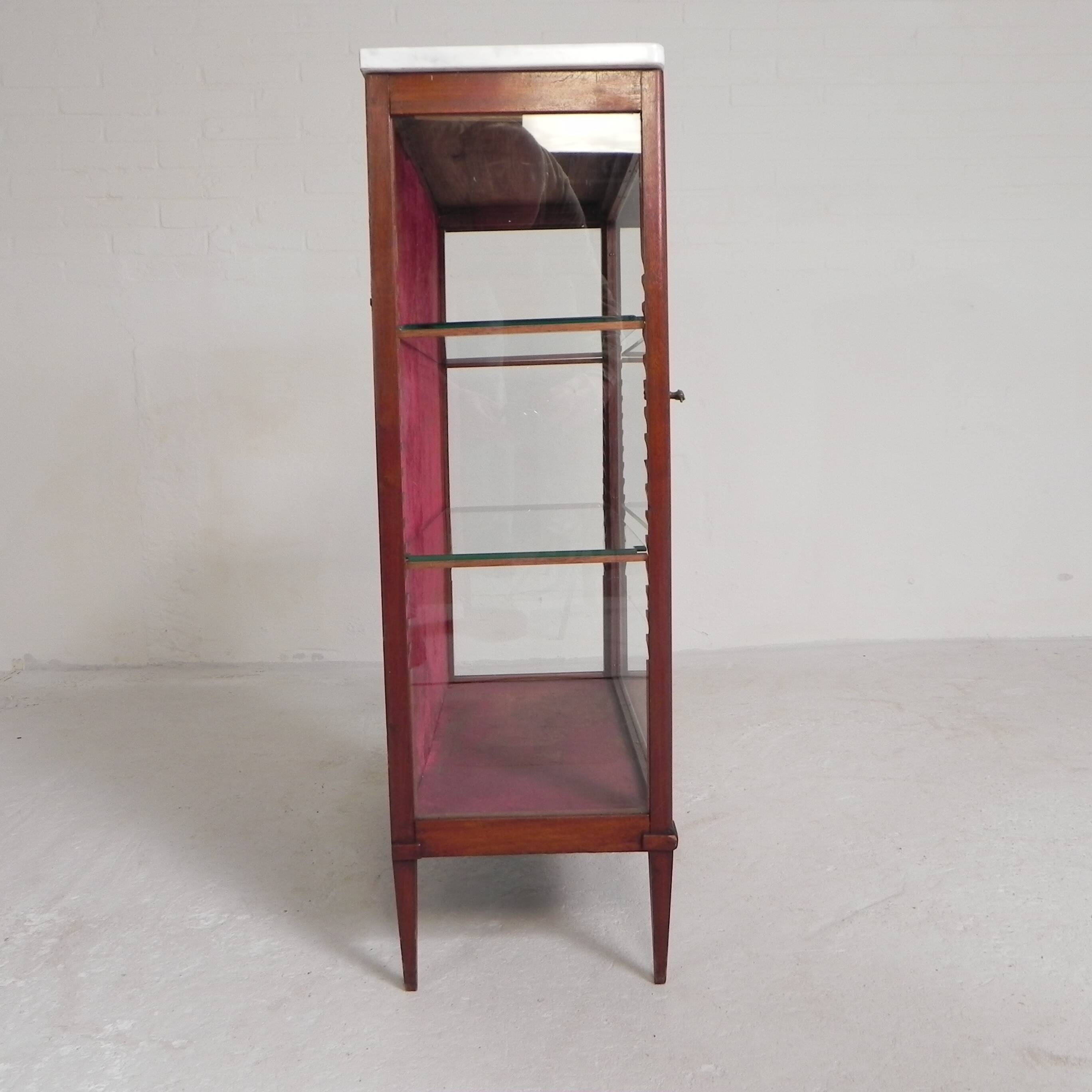 Mahogany display cabinet with marble top, 1920s