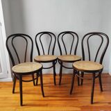 4 antique curved wood and cane chairs