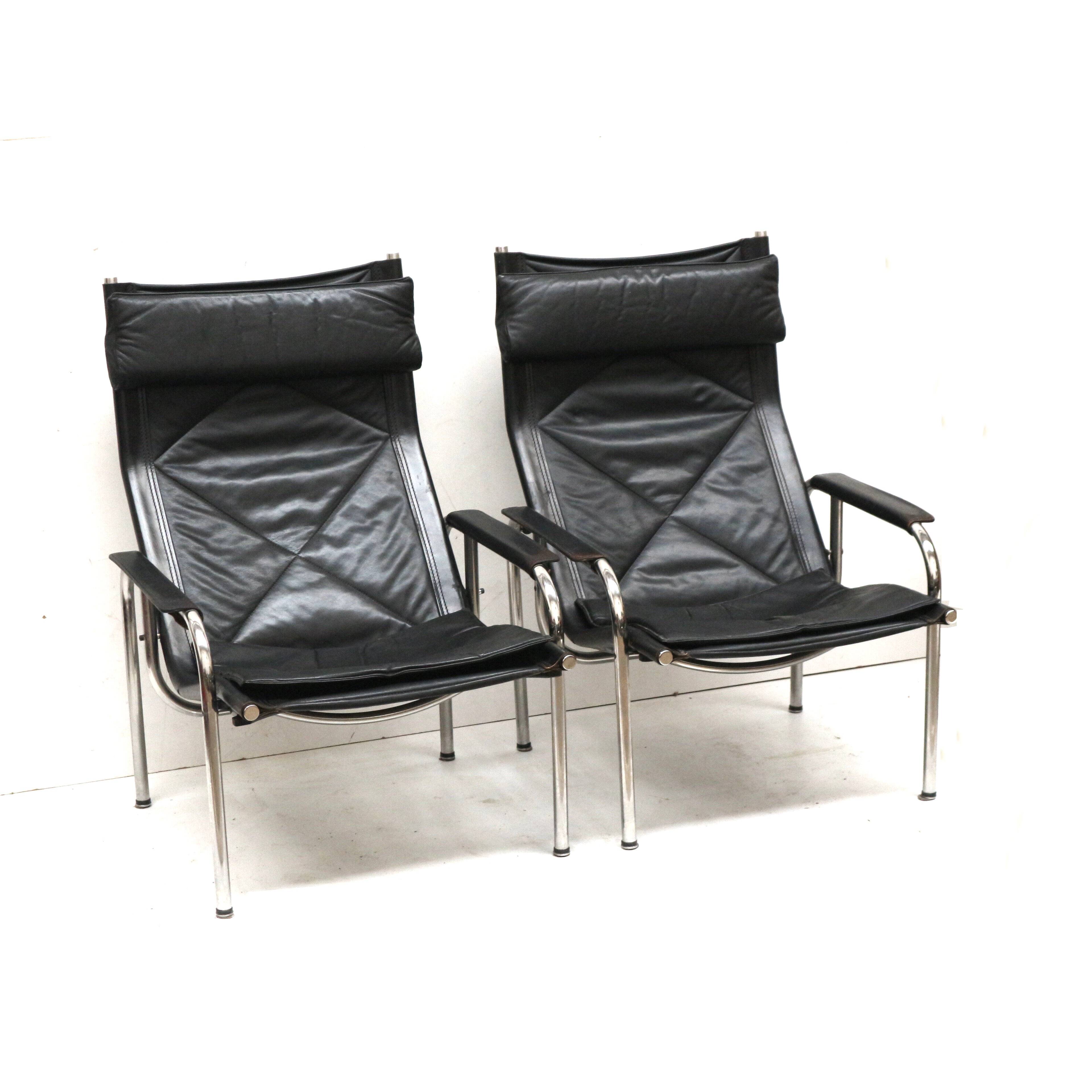 2x Vintage black leather armchair by Strässle HE1106 designed by Hans Eichenberger