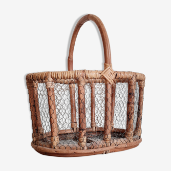 Old basket in rattan and wire mesh