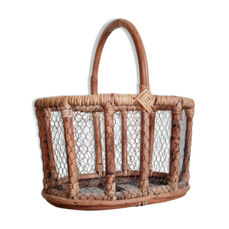 Old basket in rattan and wire mesh