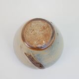 Small beige glazed ceramic vase with abstract relief pattern