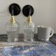 Pair of vintage electrified to nine-piece chiseled glass wall lamps