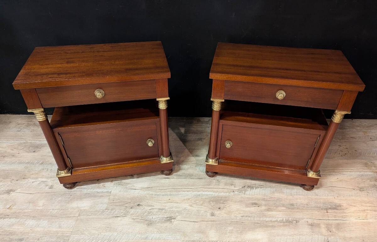 Pair of Empire style bedside tables in mahogany and gilded bronze