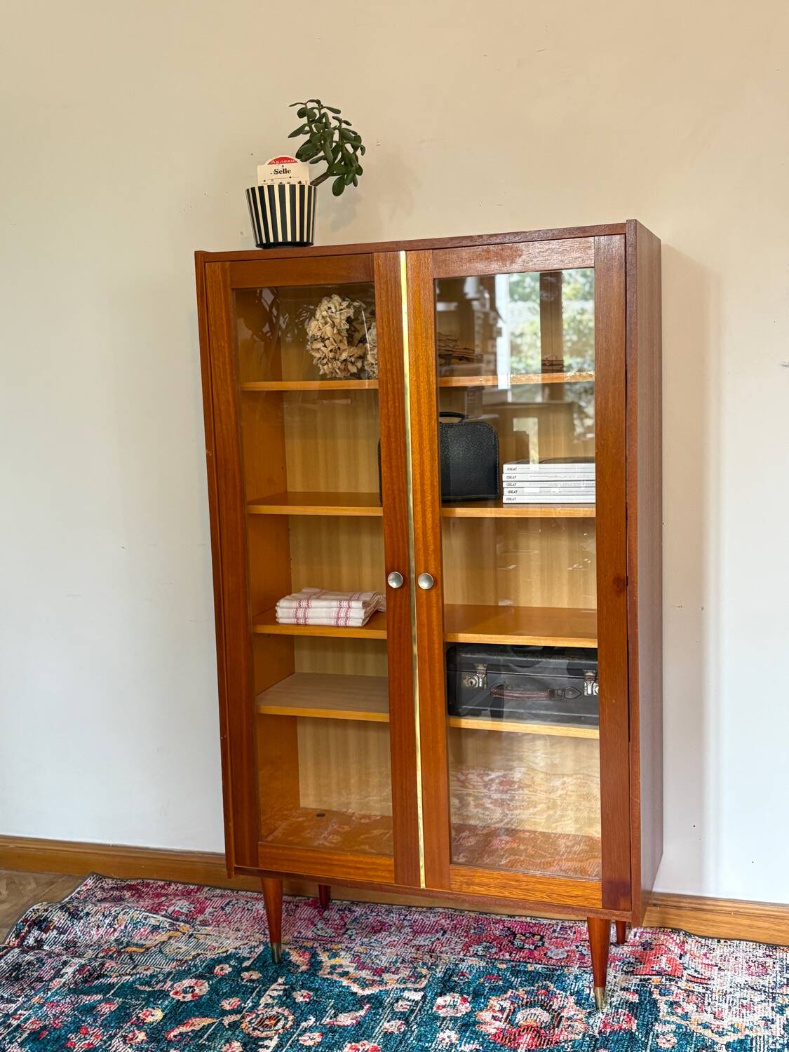 70s glass-fronted bookcase