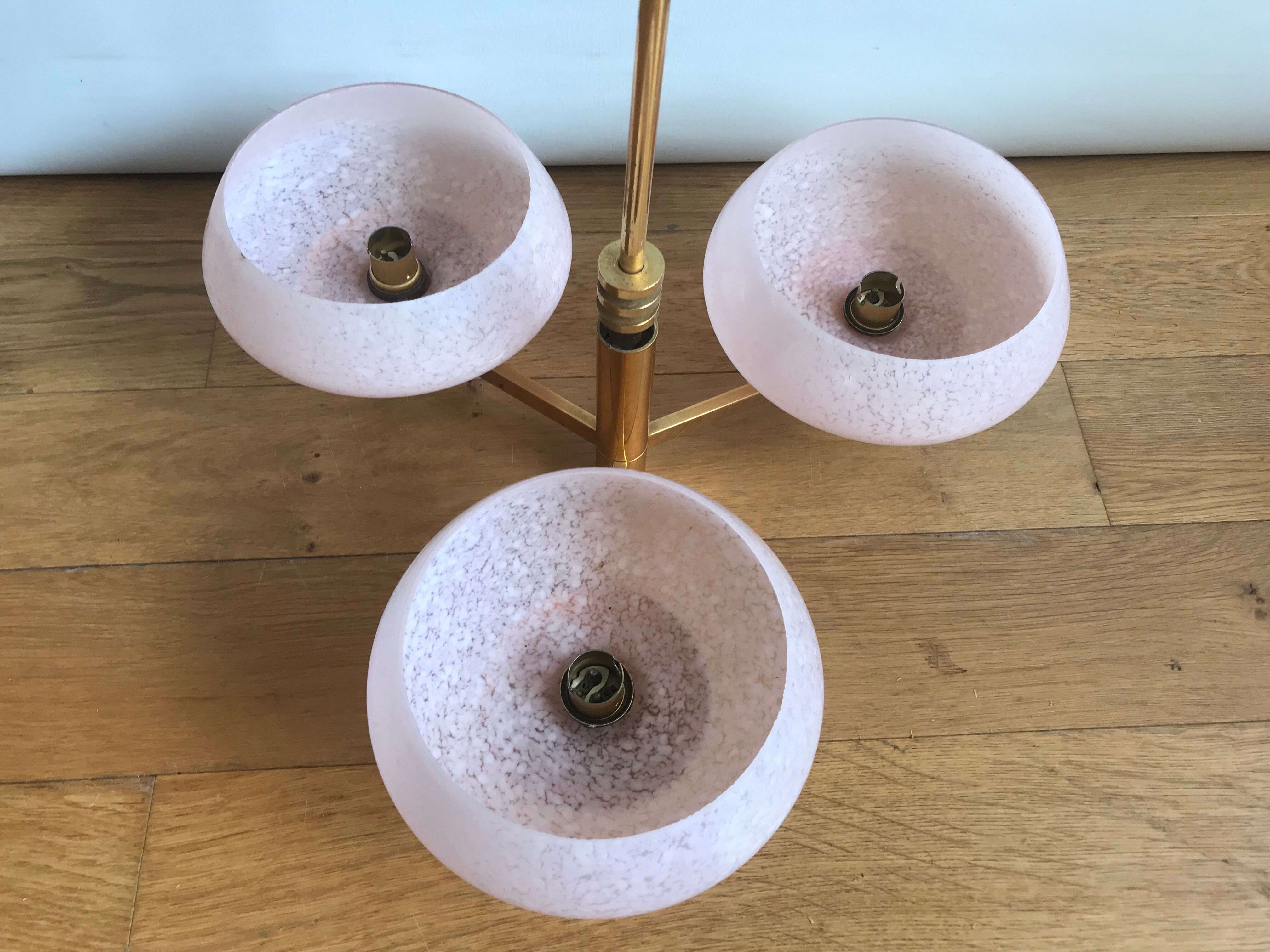Golden chandelier by Maison Sciolari