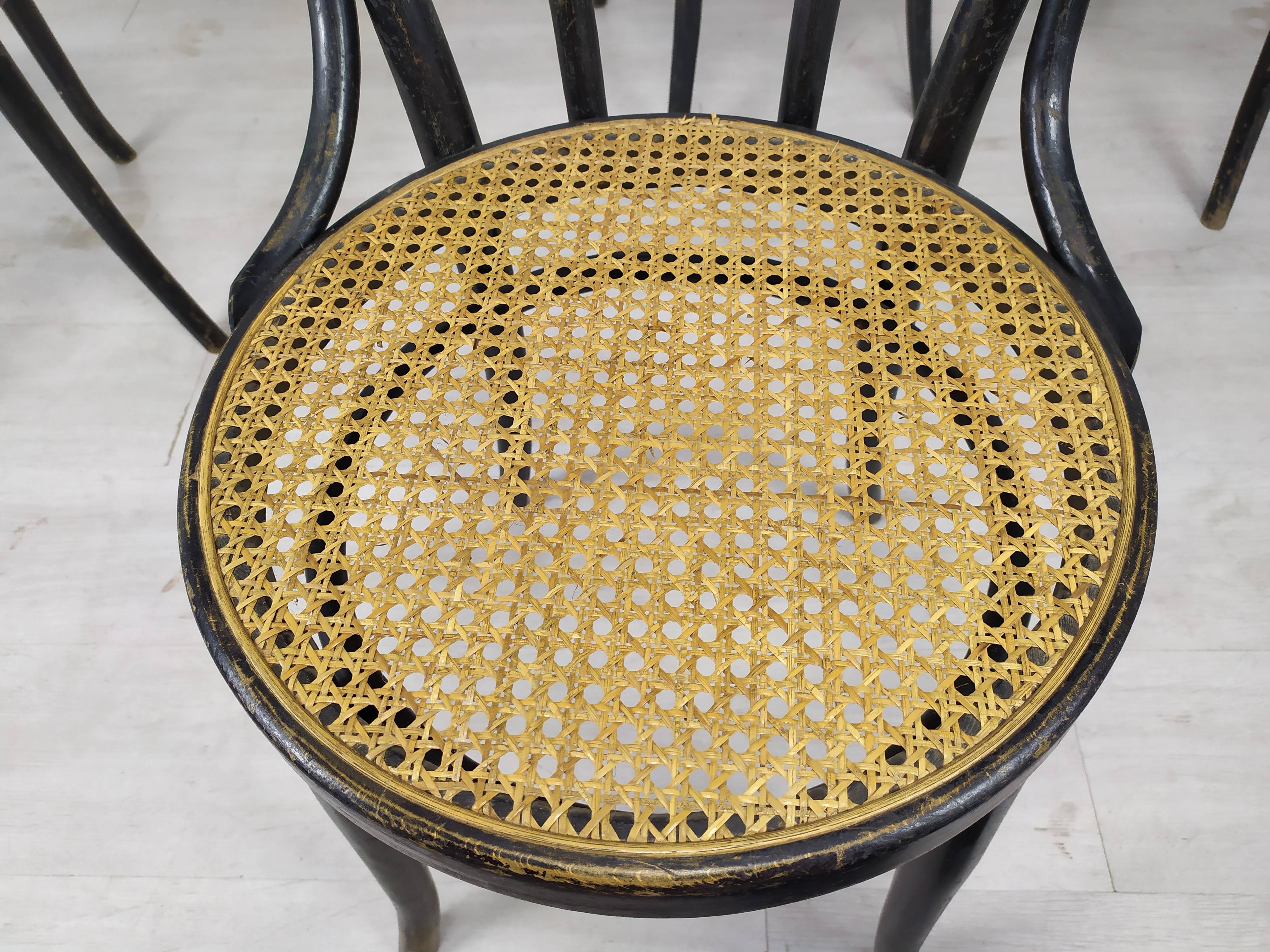 Black canned bistro chairs