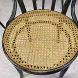 Black canned bistro chairs