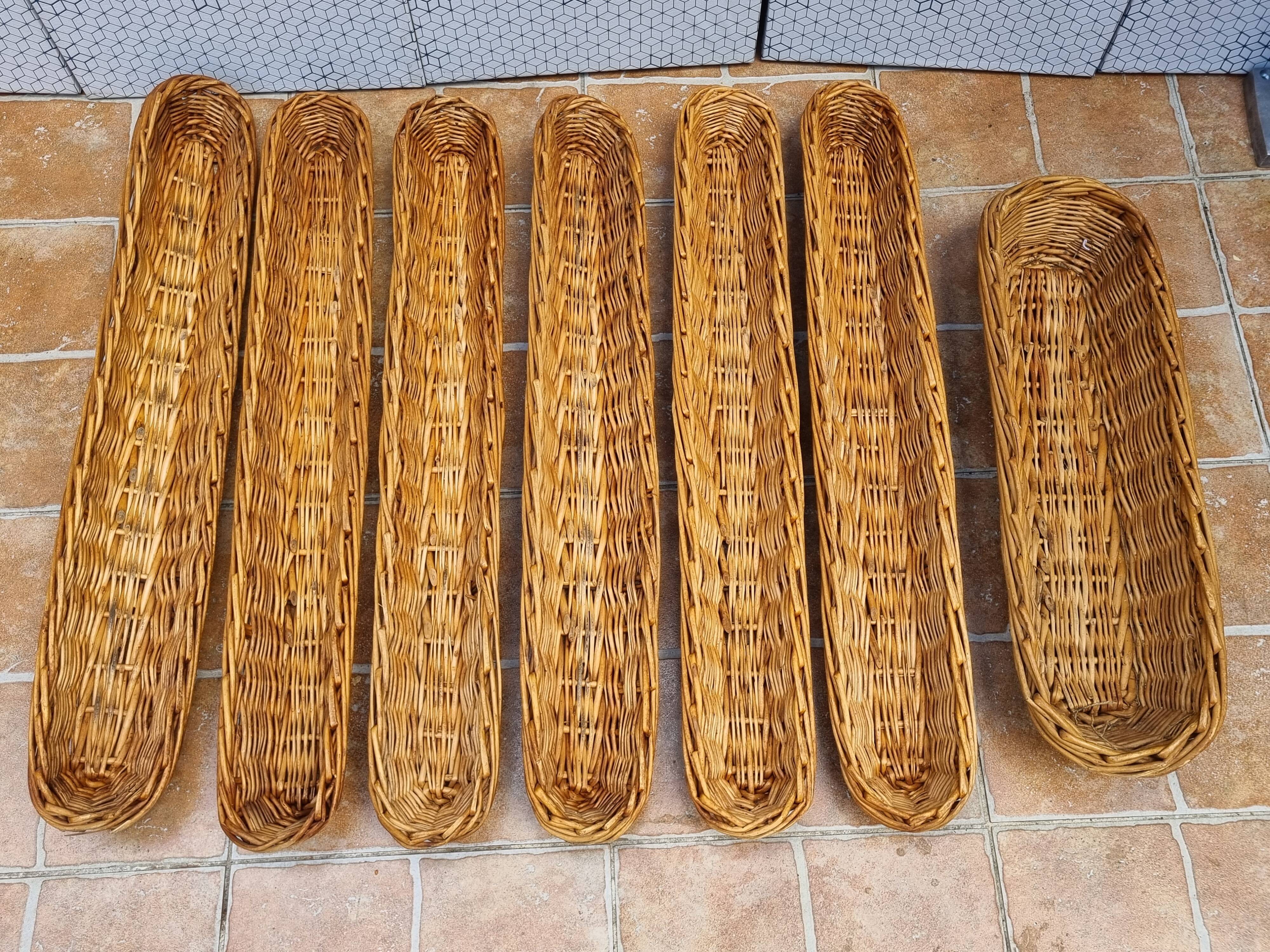 Set of 7 wicker baker's baskets, 1960s