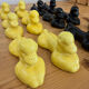 Box of 12 dog-shaped cutlery rests in yellow and black majolica.