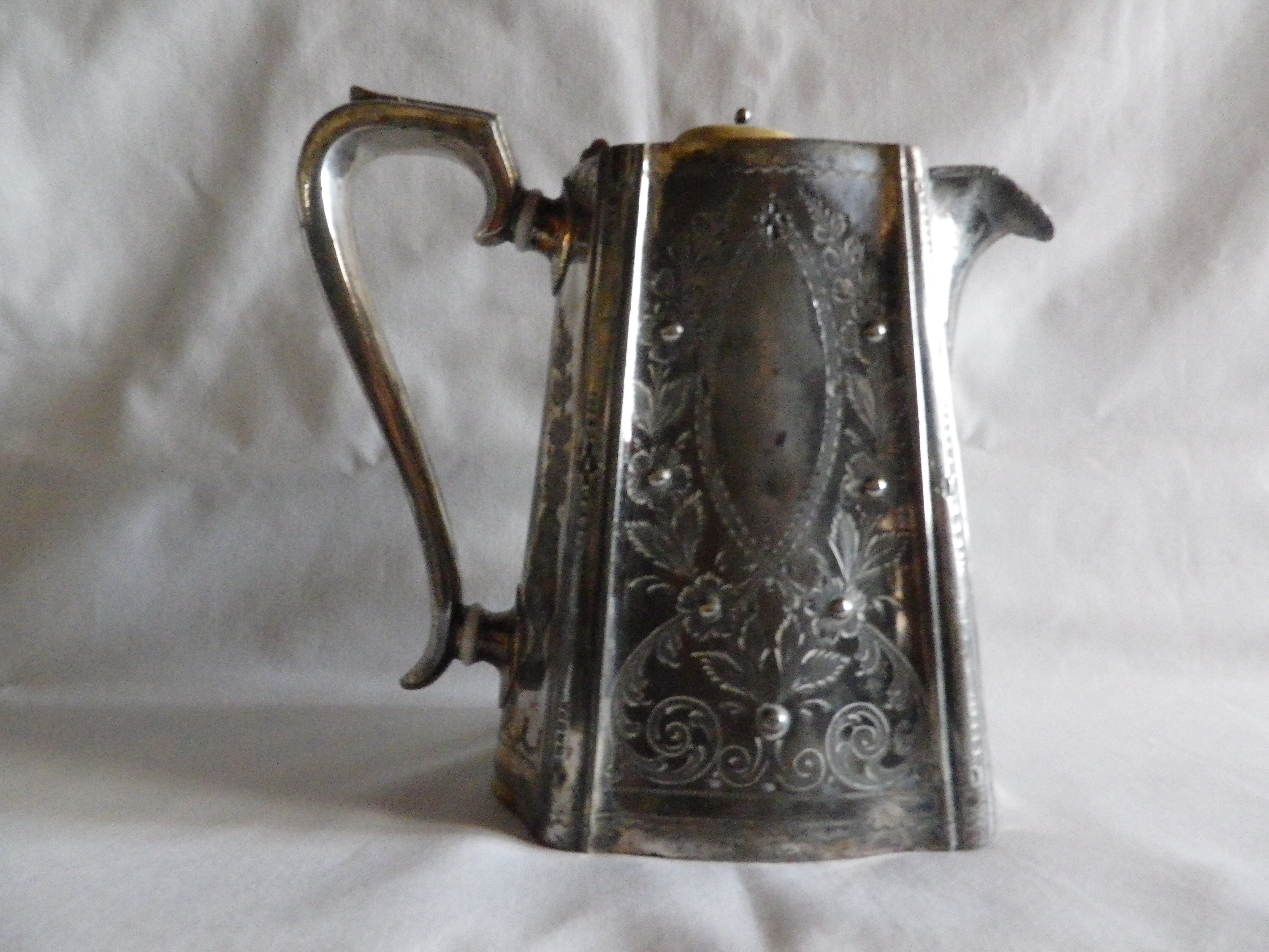 Silver metal coffee pourer