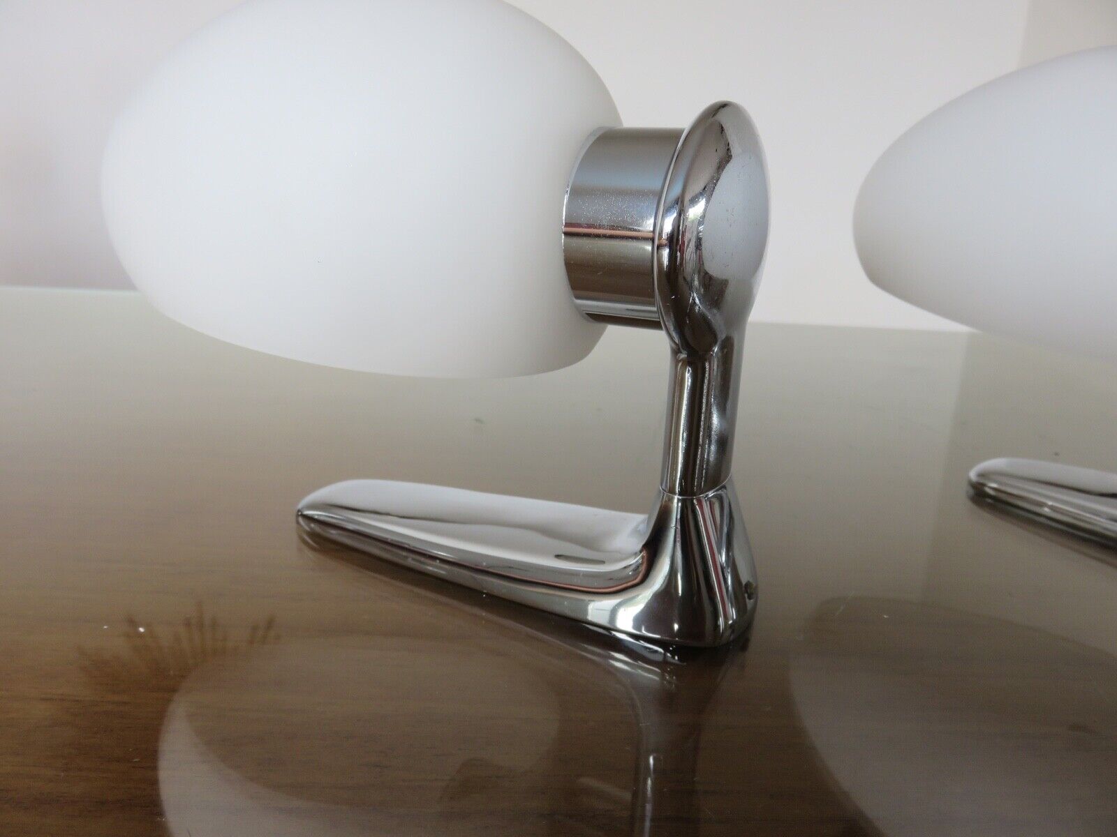 Wall lamps in chromed metal and opaline glass