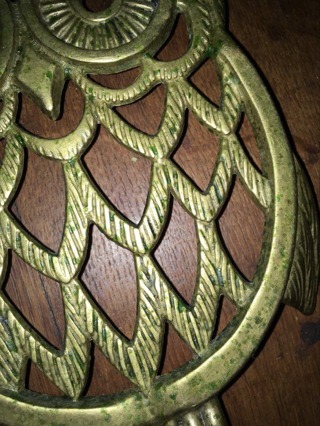 Under the nice brass dish.