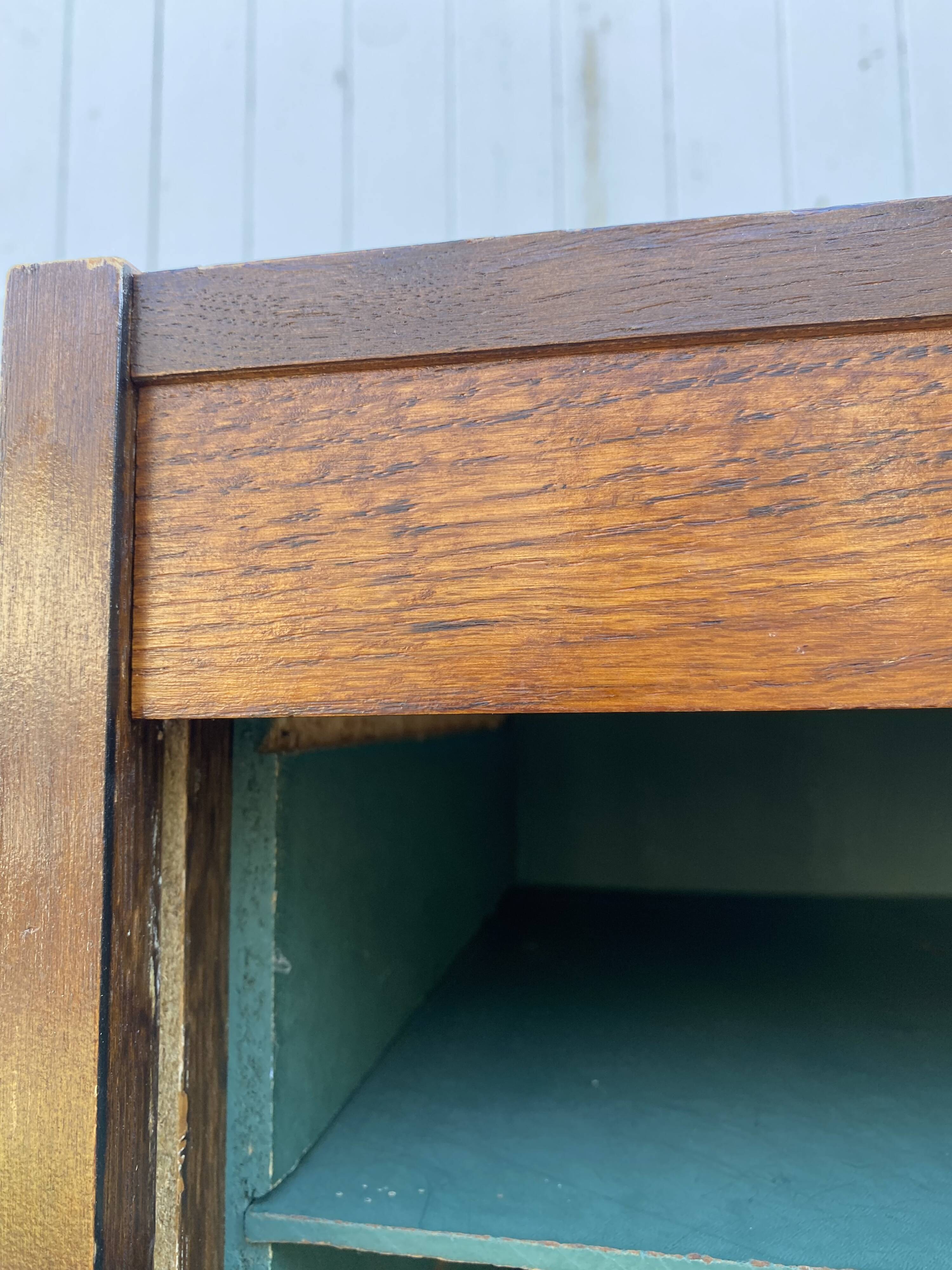 1970 oak office storage cabinet with curtains.