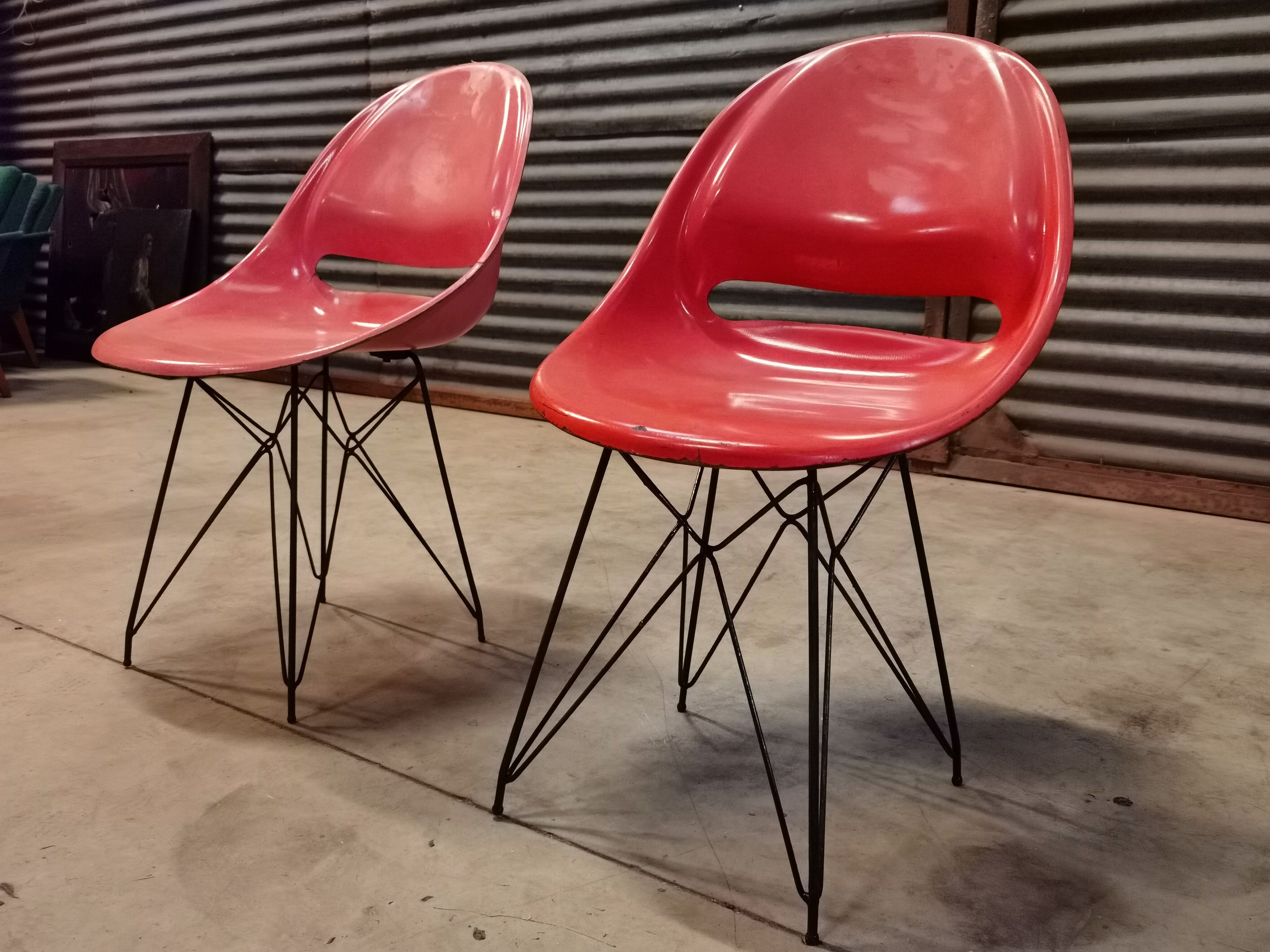 Pair of red chairs by Miroslav Navràtil for Vertex 1959