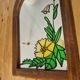 A pair of vintage stained glass style mirrors.