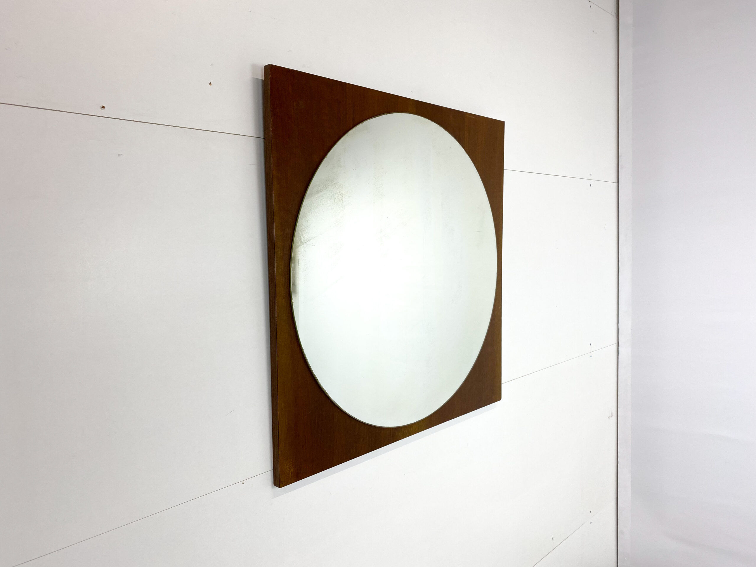 Retro mirror on wood