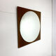Retro mirror on wood