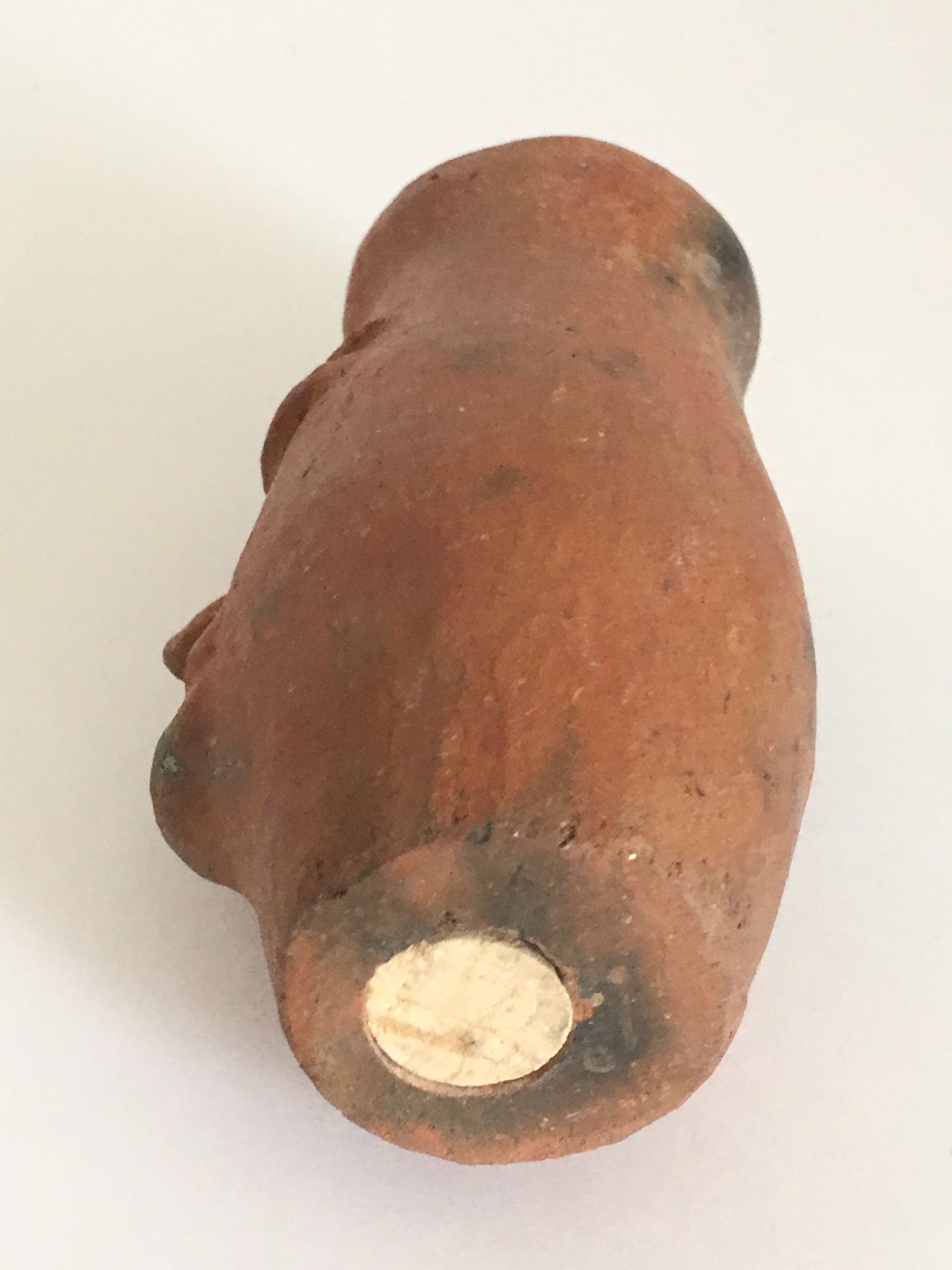 Artisanal terracotta terracotta salt shaker character head sculpture